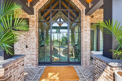 Welcome to 430 Fish Tale, a custom-designed waterfront residence on Daniel Island Club in South Carolina - for sale on GolfHomes.com, golf home, golf lot