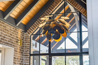 Welcome to 430 Fish Tale, a custom-designed waterfront residence on Daniel Island Club in South Carolina - for sale on GolfHomes.com, golf home, golf lot