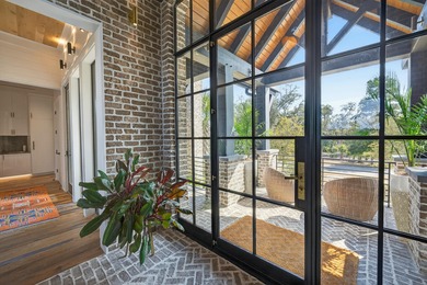 Welcome to 430 Fish Tale, a custom-designed waterfront residence on Daniel Island Club in South Carolina - for sale on GolfHomes.com, golf home, golf lot