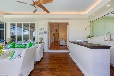 This extraordinary residence offers stunning lake and on Bentley Village Golf Course in Florida - for sale on GolfHomes.com, golf home, golf lot