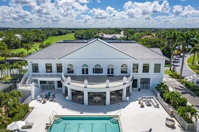 This extraordinary residence offers stunning lake and on Bentley Village Golf Course in Florida - for sale on GolfHomes.com, golf home, golf lot