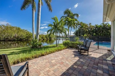 This extraordinary residence offers stunning lake and on Bentley Village Golf Course in Florida - for sale on GolfHomes.com, golf home, golf lot
