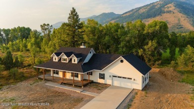 Stunning custom-built home located in the beautiful Star Valley on Star Valley RV Golf Course in Wyoming - for sale on GolfHomes.com, golf home, golf lot