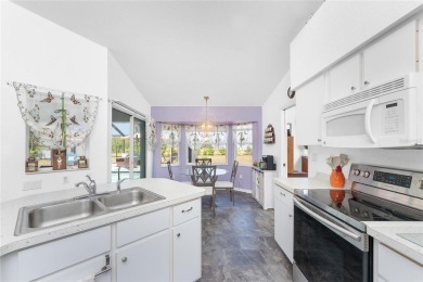 Prepare to be wowed with this desirable home seated on an on Rotonda Golf and Country Club The Palms Course in Florida - for sale on GolfHomes.com, golf home, golf lot