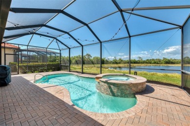 Stunning Waterfront WCI Grand Cayman in Sarasota National Lake on Sarasota National Golf Club in Florida - for sale on GolfHomes.com, golf home, golf lot