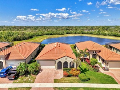 Stunning Waterfront WCI Grand Cayman in Sarasota National Lake on Sarasota National Golf Club in Florida - for sale on GolfHomes.com, golf home, golf lot