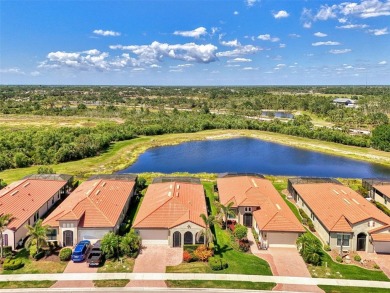 Stunning Waterfront WCI Grand Cayman in Sarasota National Lake on Sarasota National Golf Club in Florida - for sale on GolfHomes.com, golf home, golf lot