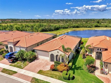 Stunning Waterfront WCI Grand Cayman in Sarasota National Lake on Sarasota National Golf Club in Florida - for sale on GolfHomes.com, golf home, golf lot