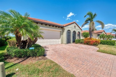 Stunning Waterfront WCI Grand Cayman in Sarasota National Lake on Sarasota National Golf Club in Florida - for sale on GolfHomes.com, golf home, golf lot