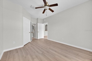 NEWLY updated(paint, flooring, dishwasher) with highly rated on Hunters Creek Golf Course in Florida - for sale on GolfHomes.com, golf home, golf lot