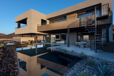 This design pays great attention to the entry procession on Reflection Bay Golf Club in Nevada - for sale on GolfHomes.com, golf home, golf lot