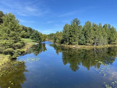 Ranger Lake waterfront lot with easy access to Lake of the on Canadian Lakes Country Club-The Highlands Course in Michigan - for sale on GolfHomes.com, golf home, golf lot