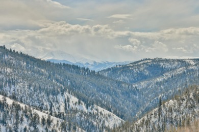 Discover the ultimate mountain retreat on this private on Headwaters Golf Course At Granby Ranch in Colorado - for sale on GolfHomes.com, golf home, golf lot