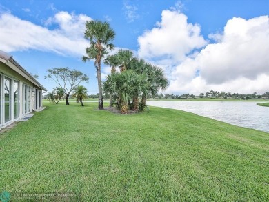 **REDUCED PRICE **Offering fabulous views of the lake and golf on Aberdeen Golf and Country Club in Florida - for sale on GolfHomes.com, golf home, golf lot