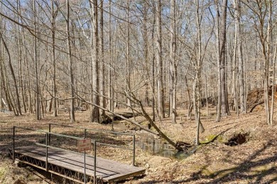 A home like this doesn't come along often! Sitting on 1.5 acres on Bridgemill Golf Club in Georgia - for sale on GolfHomes.com, golf home, golf lot