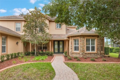 Magnificent 6-Bedroom Pool Home with Golf Course Views in on Magnolia Plantation Golf Club in Florida - for sale on GolfHomes.com, golf home, golf lot