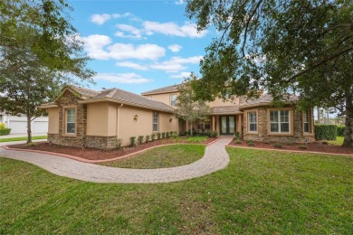 Magnificent 6-Bedroom Pool Home with Golf Course Views in on Magnolia Plantation Golf Club in Florida - for sale on GolfHomes.com, golf home, golf lot