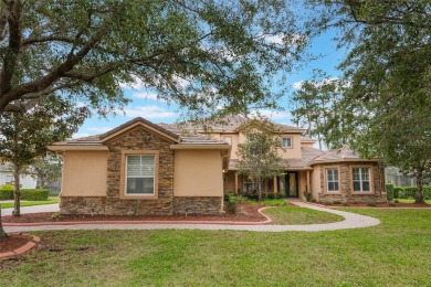 Magnificent 6-Bedroom Pool Home with Golf Course Views in on Magnolia Plantation Golf Club in Florida - for sale on GolfHomes.com, golf home, golf lot