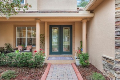 Magnificent 6-Bedroom Pool Home with Golf Course Views in on Magnolia Plantation Golf Club in Florida - for sale on GolfHomes.com, golf home, golf lot