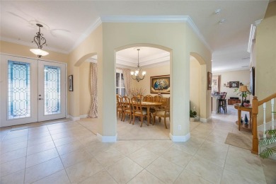 Magnificent 6-Bedroom Pool Home with Golf Course Views in on Magnolia Plantation Golf Club in Florida - for sale on GolfHomes.com, golf home, golf lot