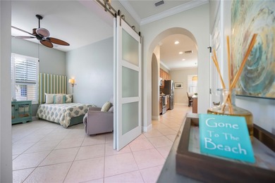 Modern updates welcome you as you step through the front door of on Venetian Golf and River Club in Florida - for sale on GolfHomes.com, golf home, golf lot