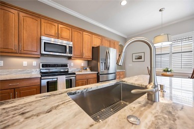 Modern updates welcome you as you step through the front door of on Venetian Golf and River Club in Florida - for sale on GolfHomes.com, golf home, golf lot