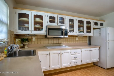 Charming and well-maintained 2-bedroom, 1-bath home in the on Greenbriar Woodlands in New Jersey - for sale on GolfHomes.com, golf home, golf lot
