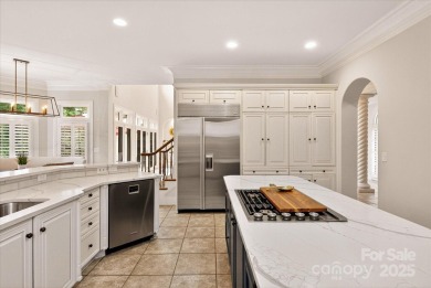 Mediterranean elegance meets luxury living in this stately on TPC at Piper Glen in North Carolina - for sale on GolfHomes.com, golf home, golf lot