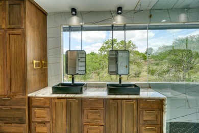 Presenting an exceptional transitional residence that embodies on Ram Rock Golf Course in Texas - for sale on GolfHomes.com, golf home, golf lot