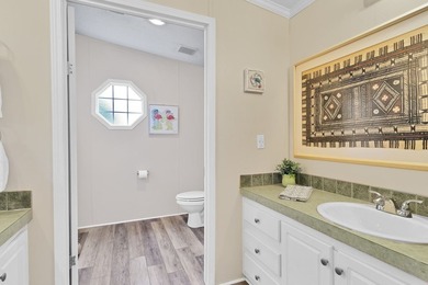 Beautifully maintained 2005 furnished home on a spacious lot. 1 on Barefoot Bay Golf Course in Florida - for sale on GolfHomes.com, golf home, golf lot