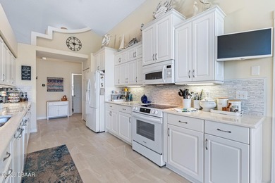 Lovingly adorned by the current owners, ICI's expanded Cayman on Plantation Bay Golf and Country Club in Florida - for sale on GolfHomes.com, golf home, golf lot