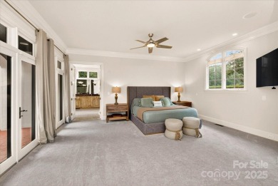 Mediterranean elegance meets luxury living in this stately on TPC at Piper Glen in North Carolina - for sale on GolfHomes.com, golf home, golf lot