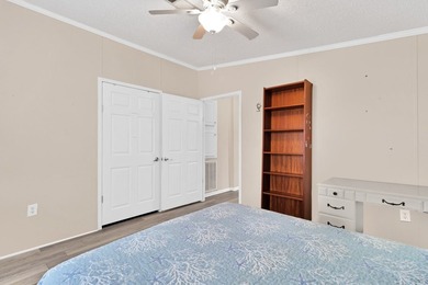 Beautifully maintained 2005 furnished home on a spacious lot. 1 on Barefoot Bay Golf Course in Florida - for sale on GolfHomes.com, golf home, golf lot