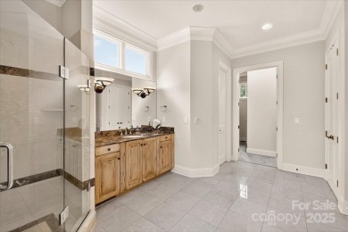Mediterranean elegance meets luxury living in this stately on TPC at Piper Glen in North Carolina - for sale on GolfHomes.com, golf home, golf lot