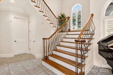 Mediterranean elegance meets luxury living in this stately on TPC at Piper Glen in North Carolina - for sale on GolfHomes.com, golf home, golf lot