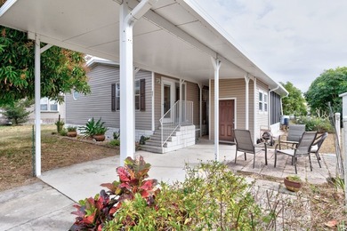 Beautifully maintained 2005 furnished home on a spacious lot. 1 on Barefoot Bay Golf Course in Florida - for sale on GolfHomes.com, golf home, golf lot