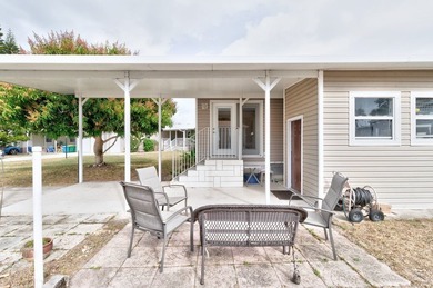 Beautifully maintained 2005 furnished home on a spacious lot. 1 on Barefoot Bay Golf Course in Florida - for sale on GolfHomes.com, golf home, golf lot