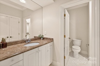 Mediterranean elegance meets luxury living in this stately on TPC at Piper Glen in North Carolina - for sale on GolfHomes.com, golf home, golf lot
