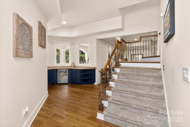Mediterranean elegance meets luxury living in this stately on TPC at Piper Glen in North Carolina - for sale on GolfHomes.com, golf home, golf lot
