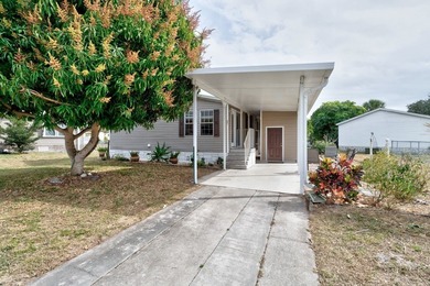 Beautifully maintained 2005 furnished home on a spacious lot. 1 on Barefoot Bay Golf Course in Florida - for sale on GolfHomes.com, golf home, golf lot