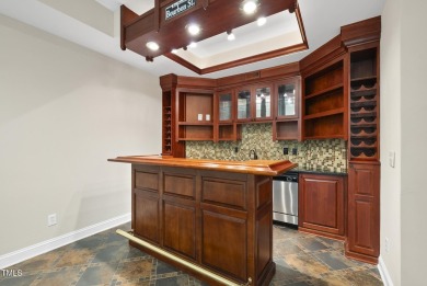 Exceptional All-Brick Golf-Front Home in the prestigious on TPC at Wakefield Plantation in North Carolina - for sale on GolfHomes.com, golf home, golf lot