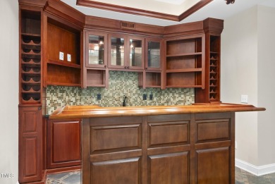 Exceptional All-Brick Golf-Front Home in the prestigious on TPC at Wakefield Plantation in North Carolina - for sale on GolfHomes.com, golf home, golf lot
