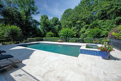 Mediterranean elegance meets luxury living in this stately on TPC at Piper Glen in North Carolina - for sale on GolfHomes.com, golf home, golf lot