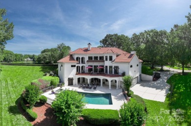 Mediterranean elegance meets luxury living in this stately on TPC at Piper Glen in North Carolina - for sale on GolfHomes.com, golf home, golf lot