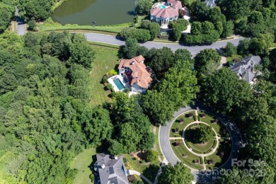 Mediterranean elegance meets luxury living in this stately on TPC at Piper Glen in North Carolina - for sale on GolfHomes.com, golf home, golf lot