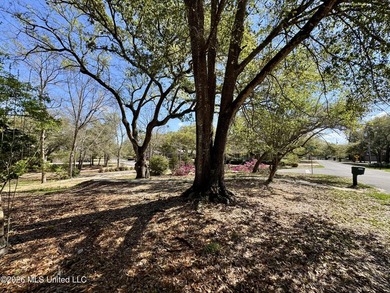 Beautiful corner lot located at 777 Moanalua Way in Diamondhead on Diamondhead Country Club in Mississippi - for sale on GolfHomes.com, golf home, golf lot