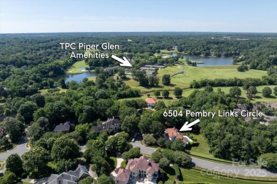 Mediterranean elegance meets luxury living in this stately on TPC at Piper Glen in North Carolina - for sale on GolfHomes.com, golf home, golf lot