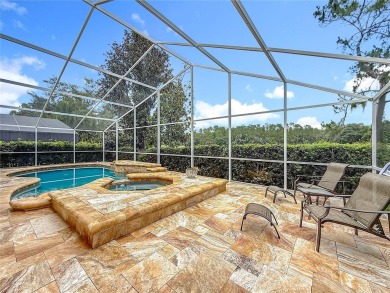 EXQUISITE 4 Bed, 4 Full Bath 3478 Sq Ft Home in the Gated and on Hunters Green Country Club in Florida - for sale on GolfHomes.com, golf home, golf lot