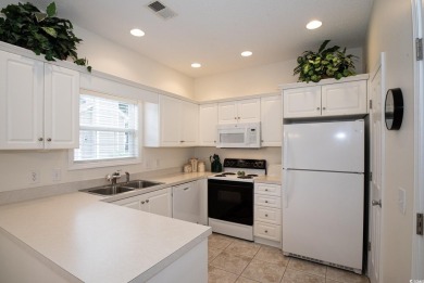 This METICULOUSLY MAINTAINED 3BD, 2.5BA TOWNHOUSE-STYLE CONDO on Surf Golf and Beach Club in South Carolina - for sale on GolfHomes.com, golf home, golf lot