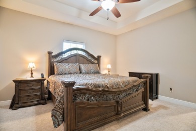 Elegant and expansive 5-bedroom, 3-bathroom home nestled in the on Ledgestone Country Club and Golf Course in Missouri - for sale on GolfHomes.com, golf home, golf lot